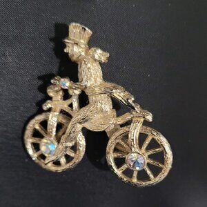 Vintage Brooch Pin Cycling Victorian Man Riding Bicycle Aurora Borealis Goldtone